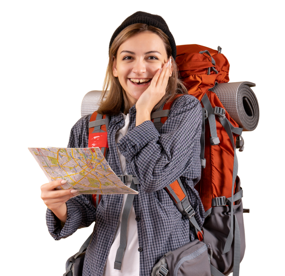 Joyful traveller with backpack holding a map